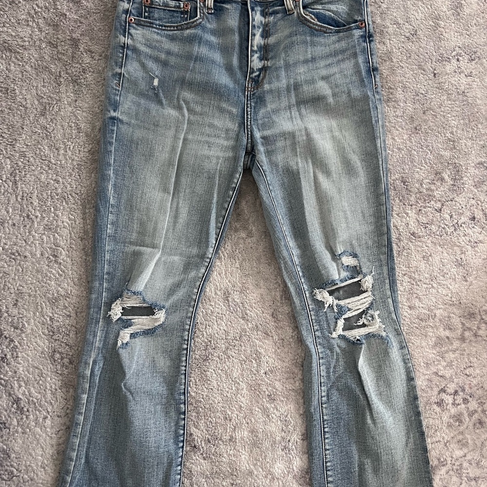 Blue Straight Leg Jeans with Distressed Details